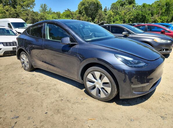 7SAYGDEEXRA238138 2024 TESLA MODEL Charcoal Front right