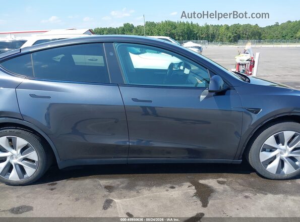 7SAYGDEEXRA264237 2024 TESLA MODEL Y Серый Вид задней части салона