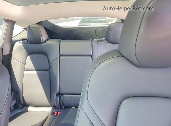 7SAYGDEEXRF025256 2024 TESLA MODEL Charcoal Rear seats view