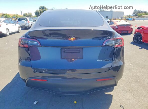 7SAYGDEEXRF025256 2024 TESLA MODEL Charcoal Rear view