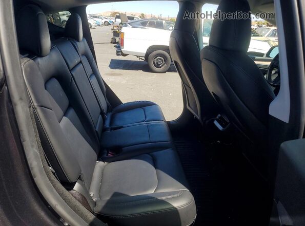 7SAYGDEEXRF025256 2024 TESLA MODEL Charcoal Rear interior view