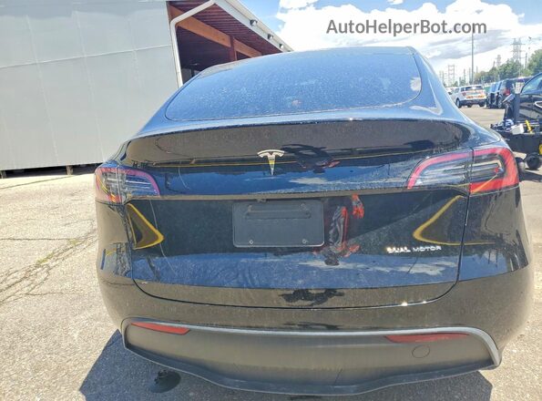 7SAYGDEEXRF206373 2024 TESLA MODEL Black Rear view