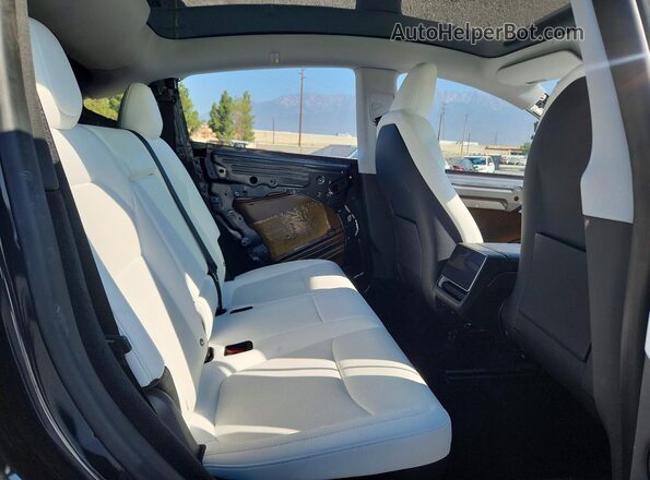 7SAYGDEEXTF364655 2026 TESLA MODEL Black Вид задніх сидінь