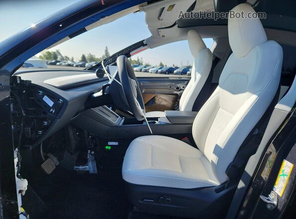 7SAYGDEEXTF364655 2026 TESLA MODEL Black Вид салону спереду