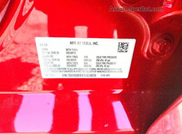 7SAYGDEEXTF634015 2026 TESLA MODEL Red VIN კოდის სტიკერის ხედი