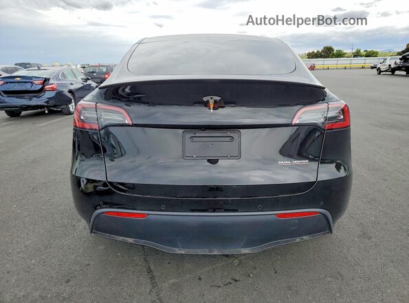 7SAYGDEF0NF484797 2022 TESLA MODEL Black Rear view