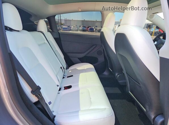 7SAYGDEF0RA324101 2024 TESLA MODEL Gray Вид задньої частини салону