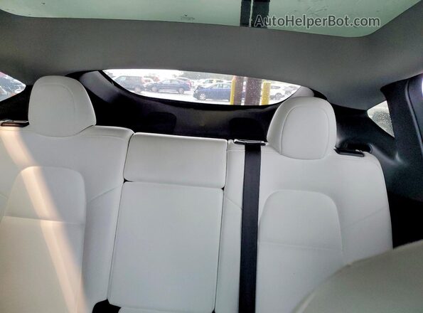7SAYGDEF0RF038851 2024 TESLA MODEL Black Вид задніх сидінь