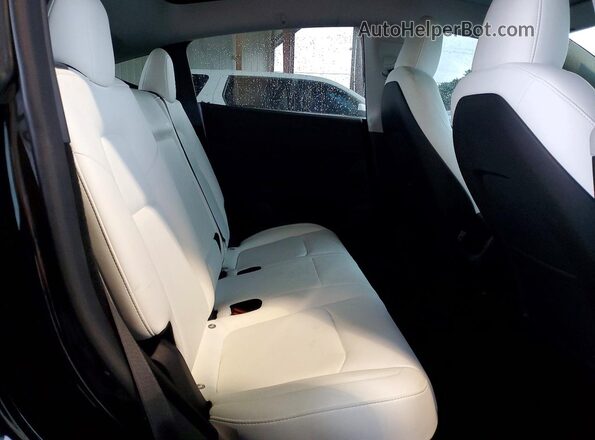 7SAYGDEF0RF038851 2024 TESLA MODEL Black Вид задньої частини салону