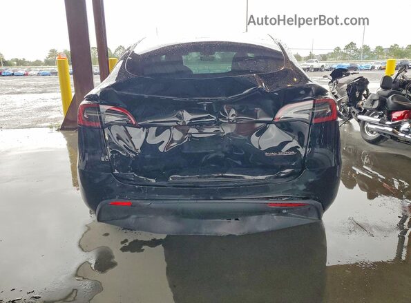 7SAYGDEF0RF038851 2024 TESLA MODEL Black Вид ззаду