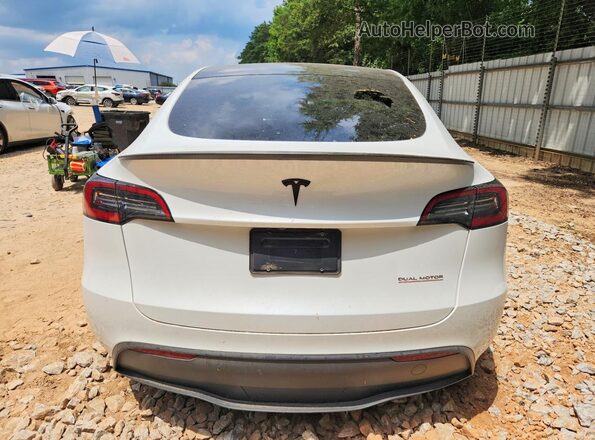 7SAYGDEF1PF809282 2023 TESLA MODEL White Rear view
