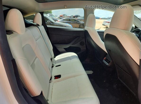 7SAYGDEF1PF809282 2023 TESLA MODEL White Rear seats view