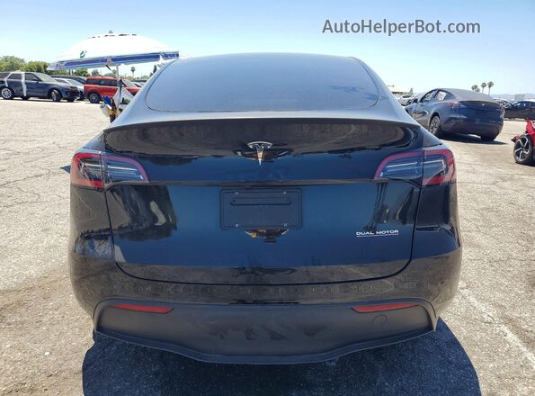 7SAYGDEF2SF311116 2025 TESLA MODEL Black Հետևի տեսք