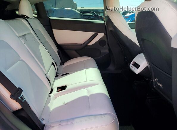 7SAYGDEF3NF416347 2022 TESLA MODEL White Rear interior view