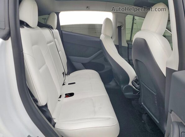 7SAYGDEF3NF560870 2022 TESLA MODEL White Vista de los asientos traseros