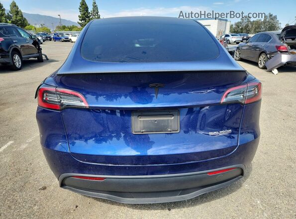 7SAYGDEF3PF682521 2023 TESLA MODEL Blue Вид ззаду