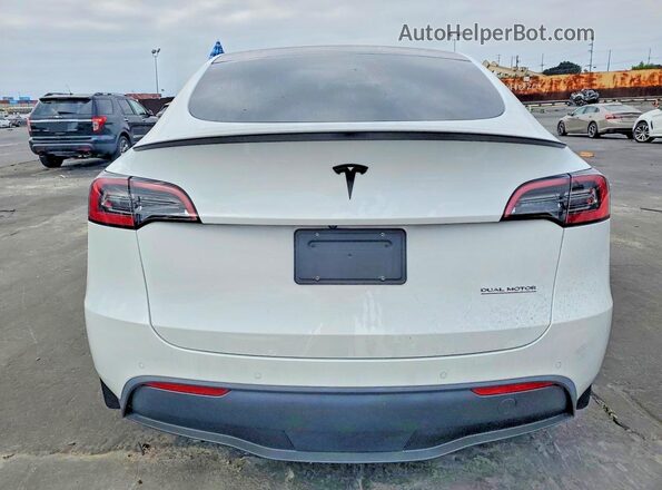 7SAYGDEF4NF507661 2022 TESLA MODEL White Вид ззаду