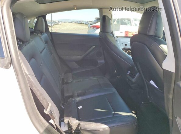 7SAYGDEF4PF593749 2023 TESLA MODEL White Vista interior trasera