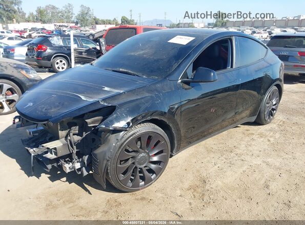 7SAYGDEF5NF328061 2022 TESLA MODEL Y Black Առջևի ձախ երեք քառորդ տեսարան