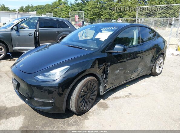 7SAYGDEF5PF915587 2023 TESLA MODEL Y Black Передня ліва чверть