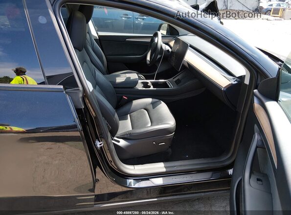 7SAYGDEF5PF915587 2023 TESLA MODEL Y Black Вид салону спереду