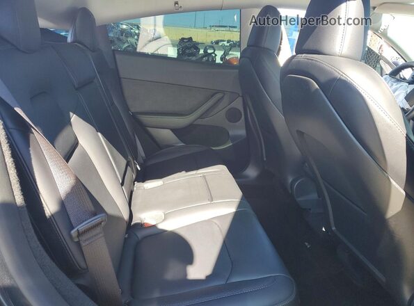 7SAYGDEF5RF050803 2024 TESLA MODEL Black Вид задніх сидінь
