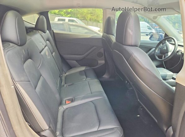 7SAYGDEF6NF451884 2022 TESLA MODEL Gray Rear interior view