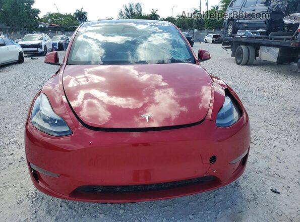 7SAYGDEF6PF585930 2023 TESLA MODEL Burgundy Вид спереду