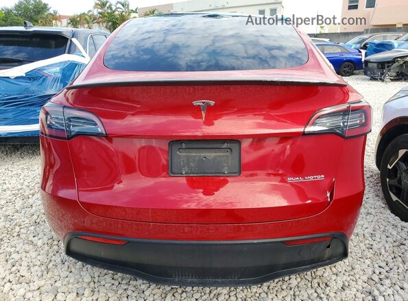 7SAYGDEF6PF585930 2023 TESLA MODEL Burgundy Вид ззаду