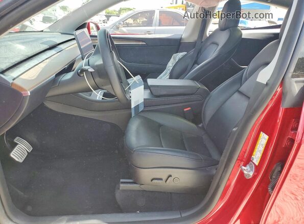 7SAYGDEF6PF585930 2023 TESLA MODEL Burgundy Вид салону спереду