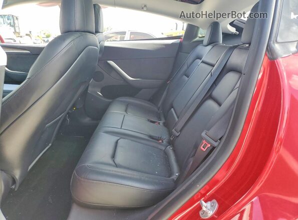 7SAYGDEF6PF585930 2023 TESLA MODEL Burgundy Вид задніх сидінь