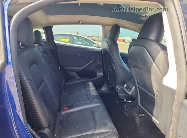 7SAYGDEF6PF826708 2023 TESLA MODEL Blue Vista interior trasera