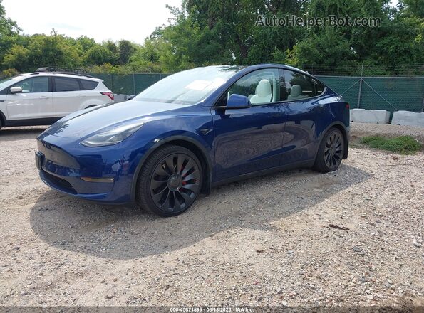 7SAYGDEF6PF969867 2023 TESLA MODEL Y Blue Передня ліва чверть
