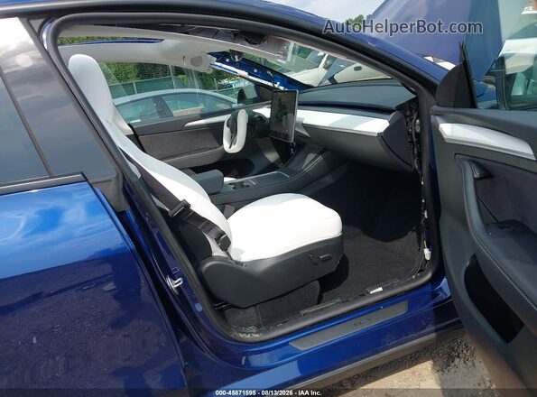 7SAYGDEF6PF969867 2023 TESLA MODEL Y Blue Вид салону спереду