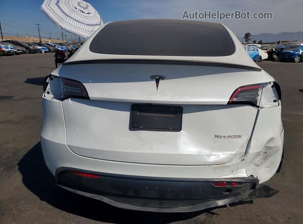 7SAYGDEF6RF128103 2024 TESLA MODEL White Հետևի տեսք