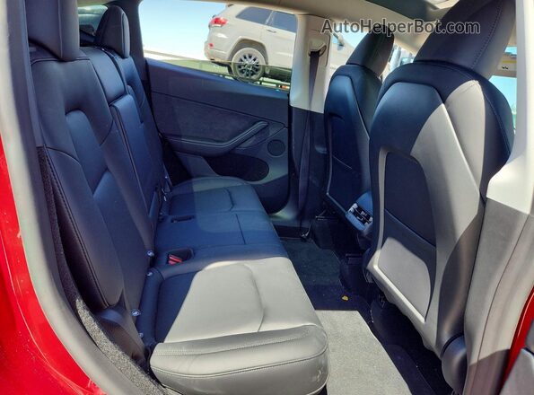 7SAYGDEF6SA374569 2025 TESLA MODEL Red Vista de los asientos traseros