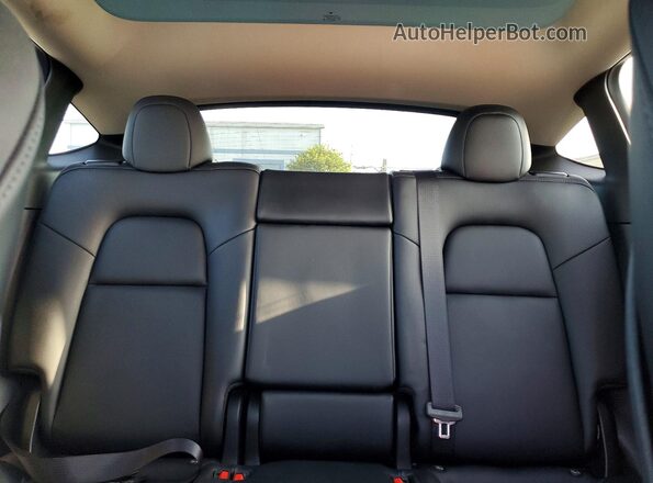7SAYGDEF7NF490726 2022 TESLA MODEL Black Vista de los asientos traseros