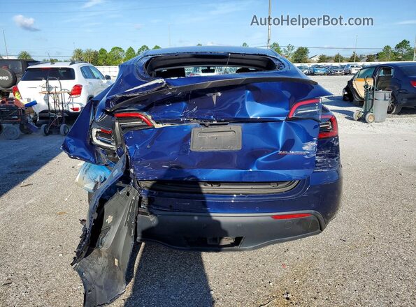 7SAYGDEF7NF516001 2022 TESLA MODEL Blue Հետևի տեսք