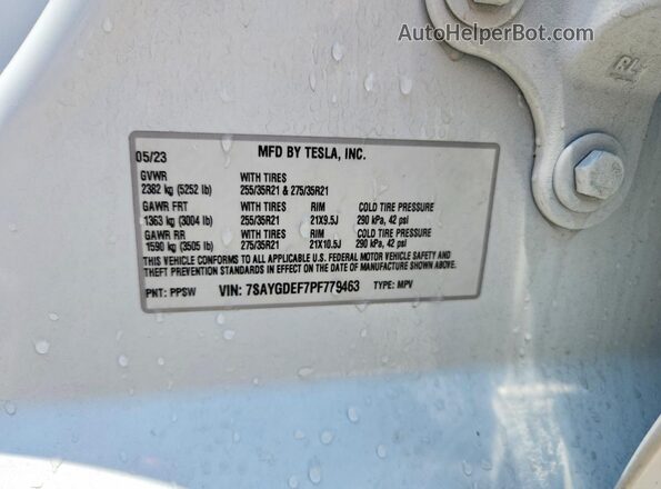 7SAYGDEF7PF779463 2023 TESLA MODEL White VIN կոդի պիտակի տեսք