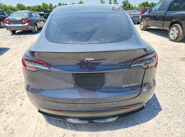 7SAYGDEF7PF874976 2023 TESLA MODEL Gray Vista trasera