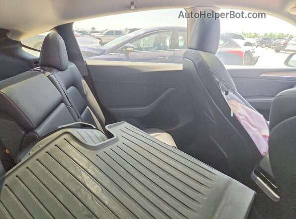7SAYGDEF7PF874976 2023 TESLA MODEL Gray Vista de los asientos traseros
