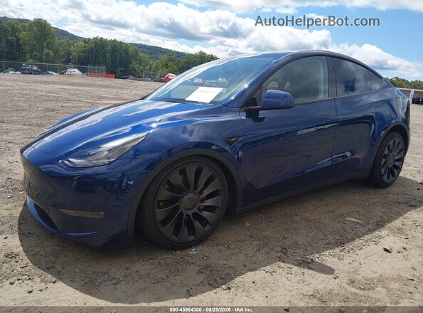 7SAYGDEF7RA327187 2024 TESLA MODEL Y Blue Przód lewy