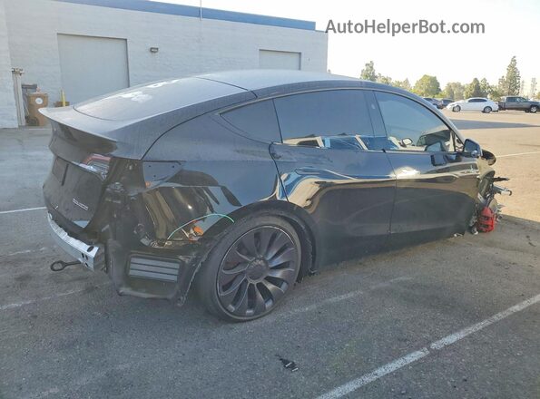 7SAYGDEF7RF058515 2024 TESLA MODEL Black Tył prawy