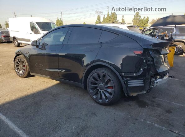 7SAYGDEF7RF058515 2024 TESLA MODEL Black Tył lewy