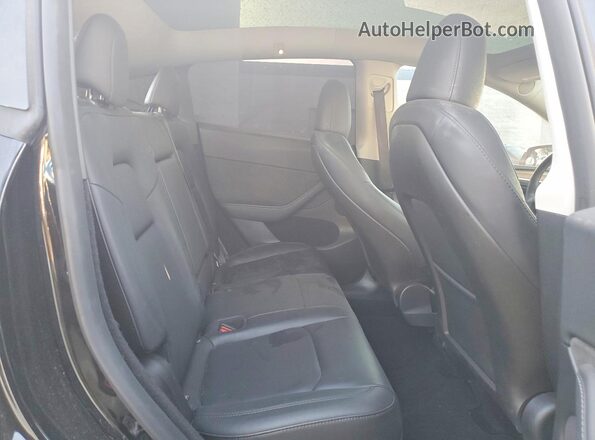 7SAYGDEF7RF058515 2024 TESLA MODEL Black Widok tylnych siedzeń
