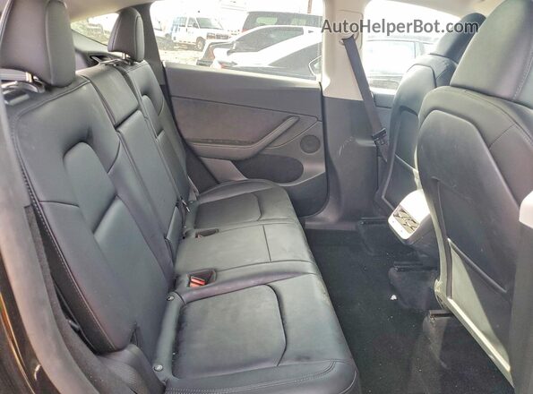 7SAYGDEF8PF811465 2023 TESLA MODEL Black Vista de los asientos traseros