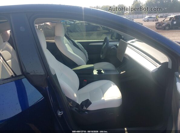 7SAYGDEF8PF836642 2023 TESLA MODEL Y Blue Вид салону спереду