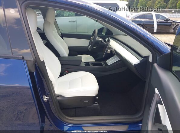 7SAYGDEF9NF390112 2022 TESLA MODEL Y Blue Вид салону спереду