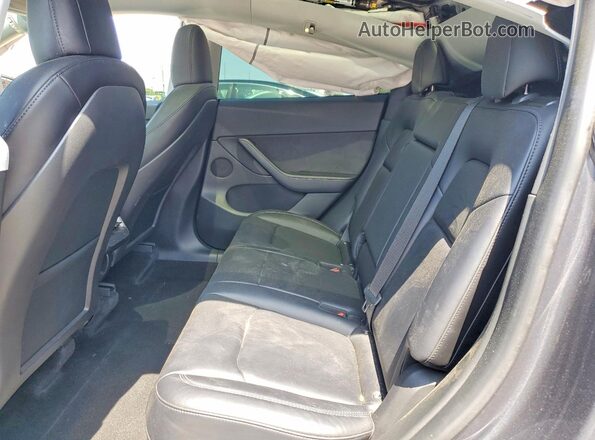 7SAYGDEF9NF395794 2022 TESLA MODEL Gray Rear seats view