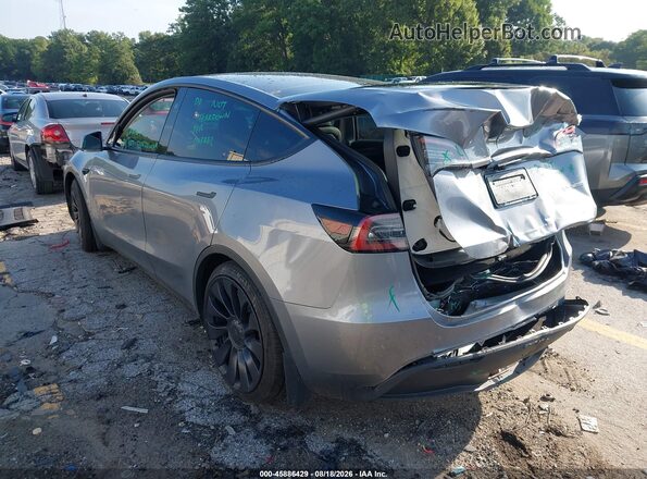 7SAYGDEF9SA338715 2025 TESLA MODEL Y Gray Trasero izquierdo